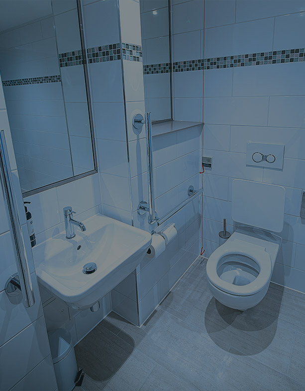 White tiled student bathroom